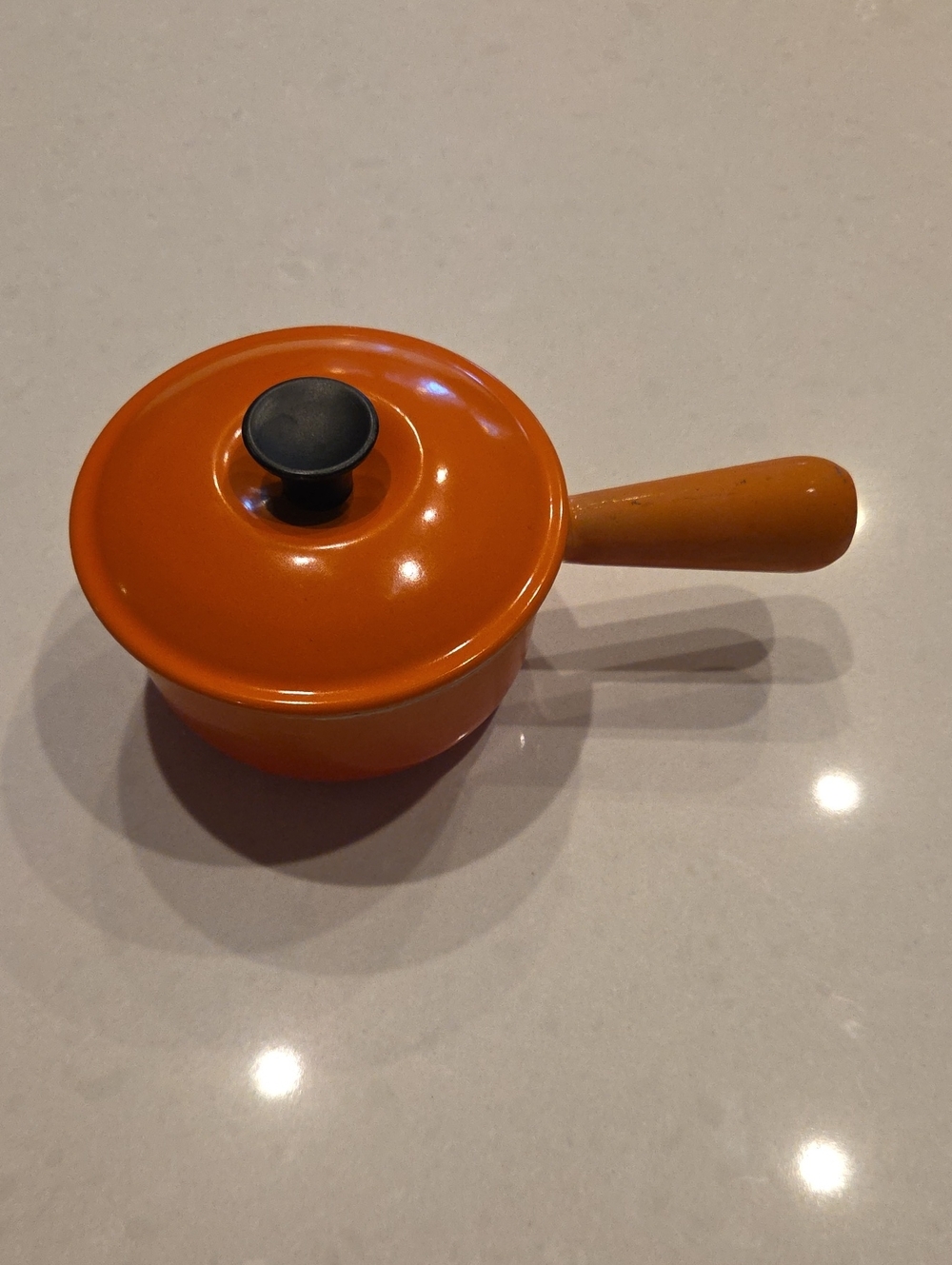 Le Creuset Vintage Orange Enamel Saucepan with Black Knob and Handle